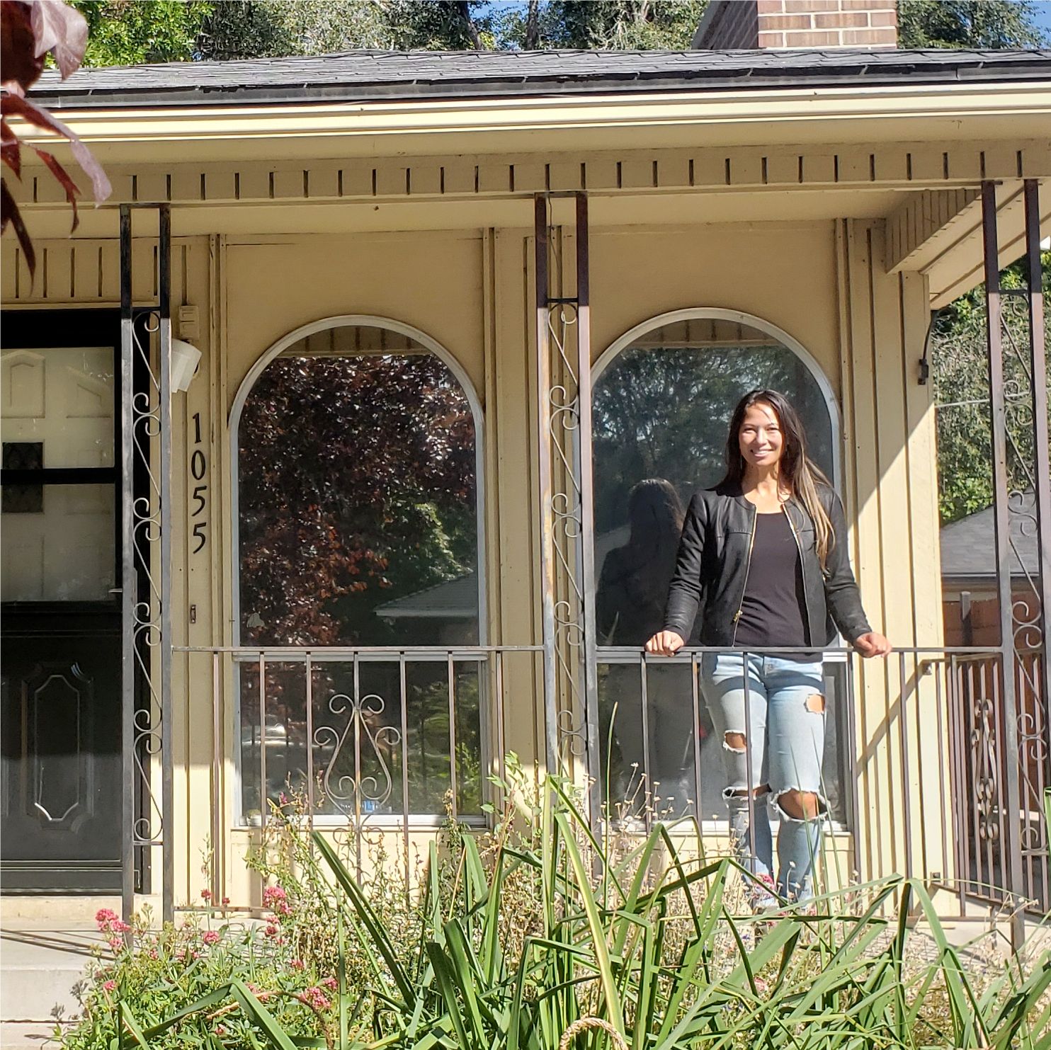 Katie outside her rental property